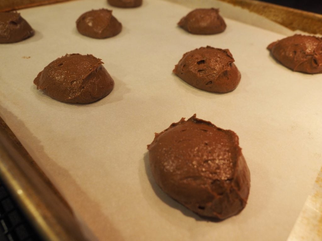 Whoppie Pie batter on a parchment lined baking sheet