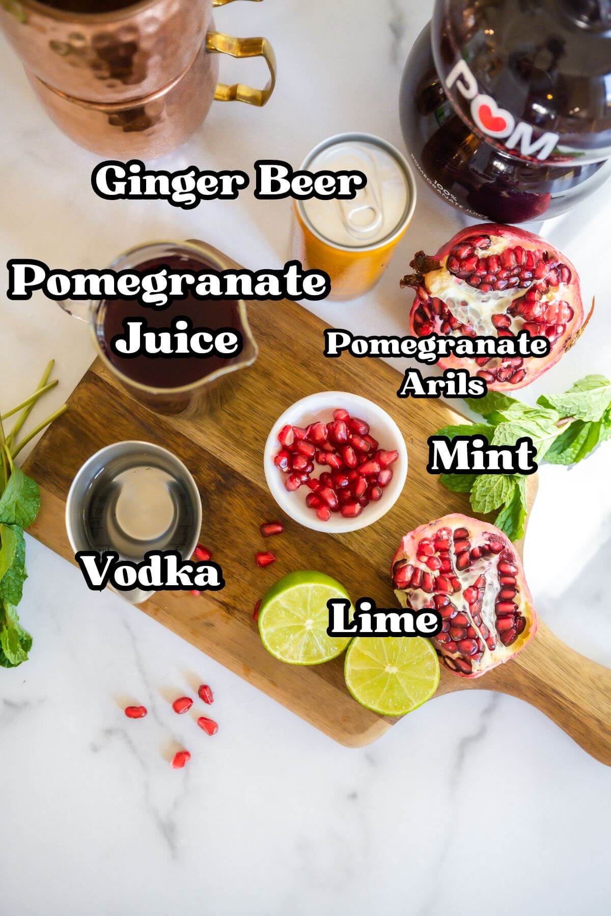 Labeled ingredients for pomegranate moscow mule.