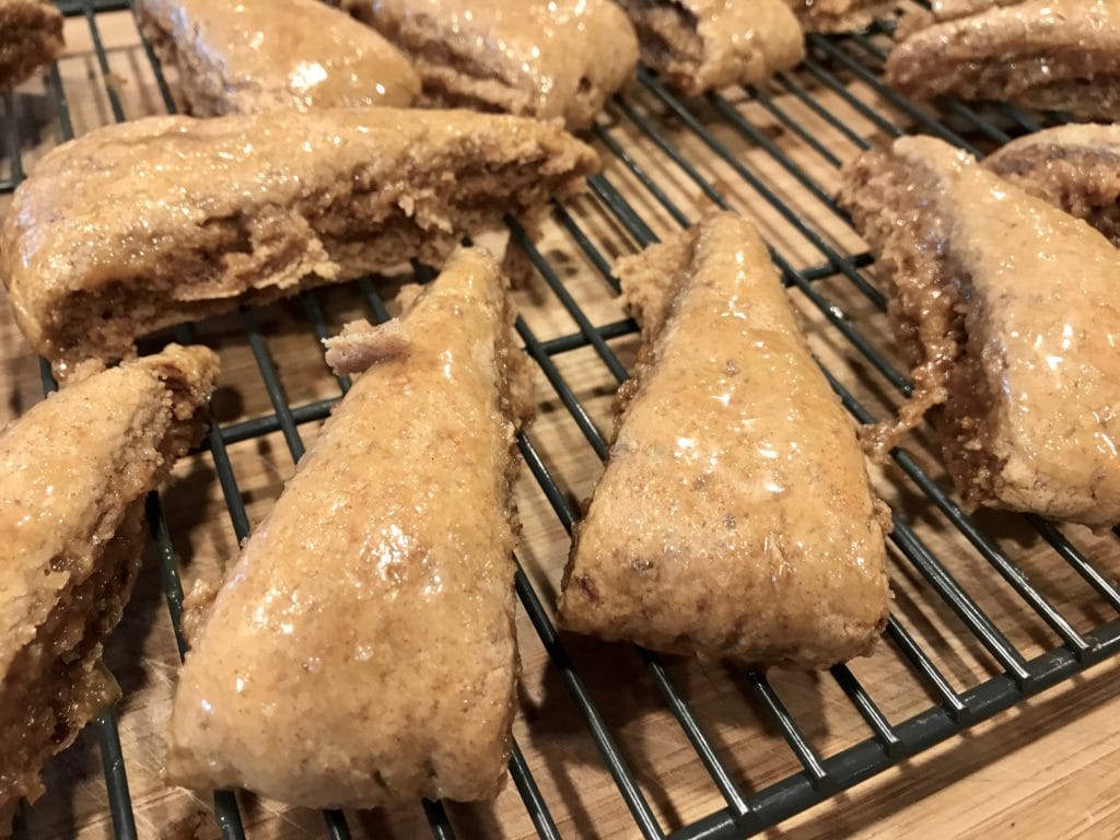 glazed date scones on cooling rack.