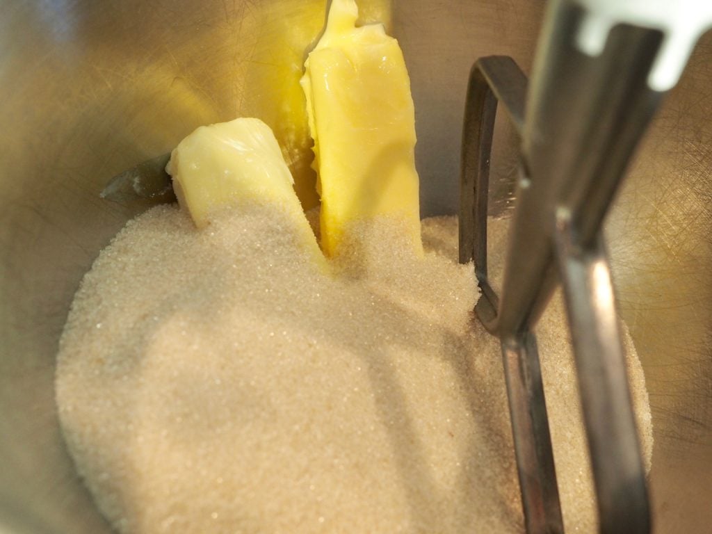 Soft butter and all natural cane sugar in bowl of mixer. 