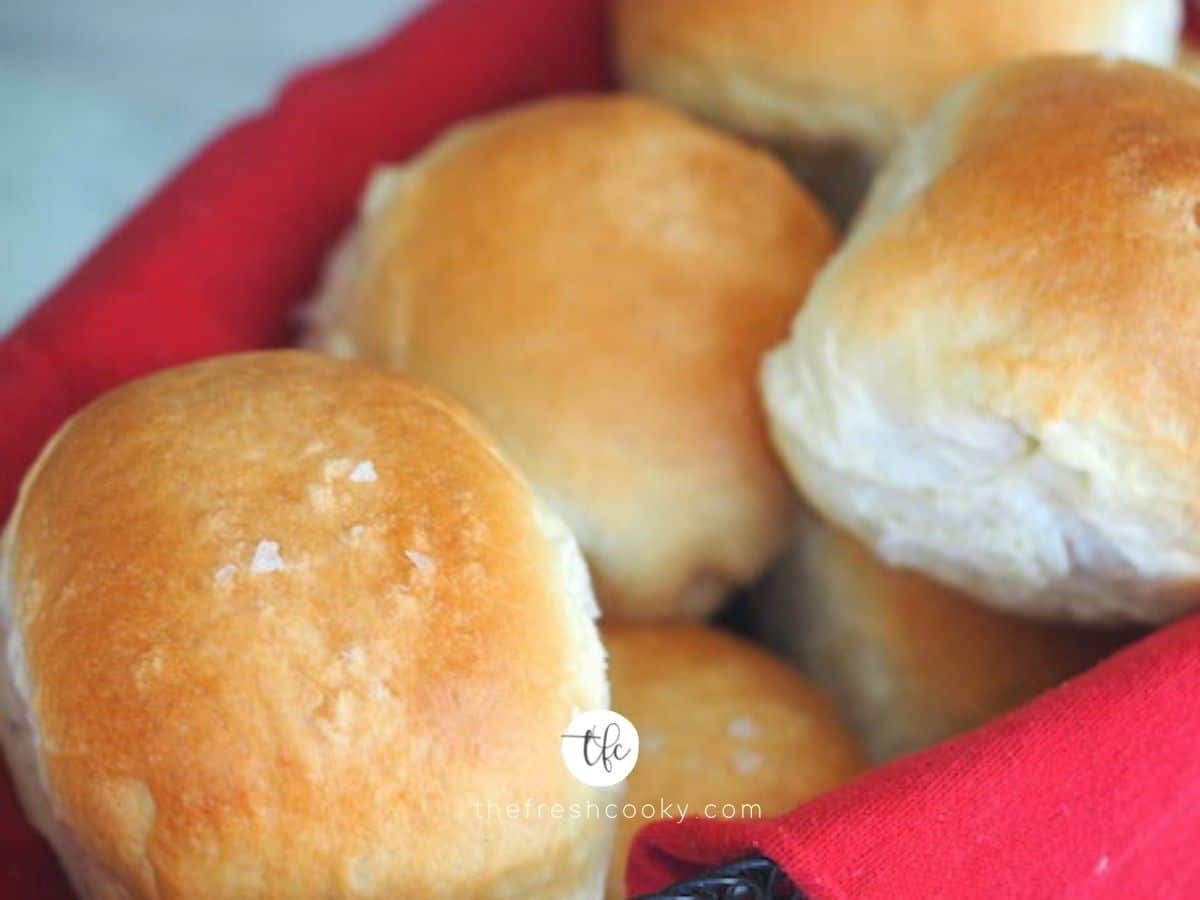 Easy Yeast Rolls for beginners facebook post, with soft, fluffy yeast rolls in a basket.