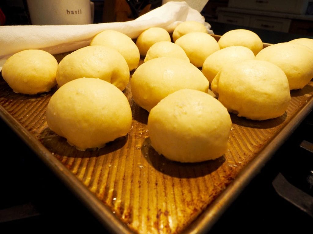 Close up of yeast rolls ready to go going into oven. 