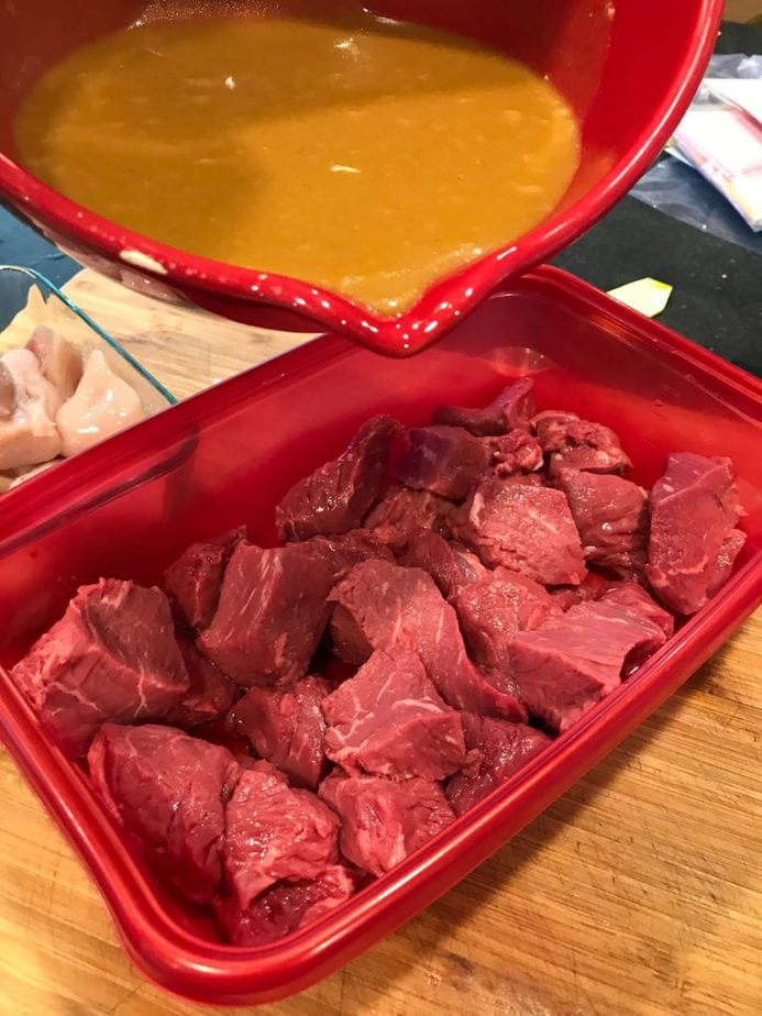 Pouring marinade on beef | www.thefreshcooky.com
