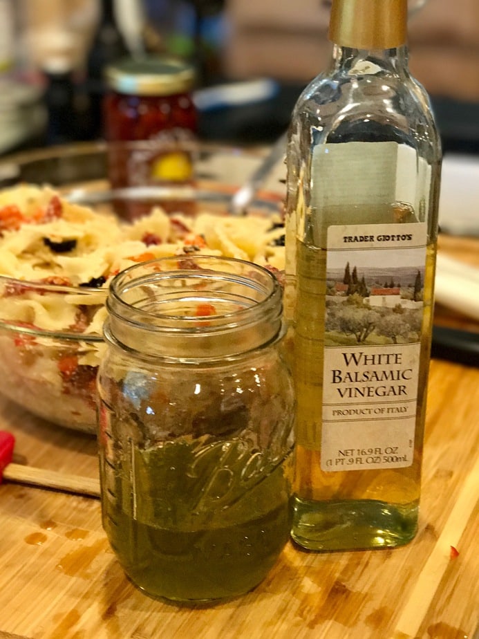 Vinegar and oil in a jar for vinaigrette.