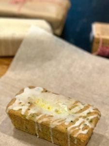 lemon zucchini bread on parchment sheet | www.thefreshcooky.com