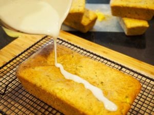 lemon glaze poured on loaf | www.thefreshcooky.com