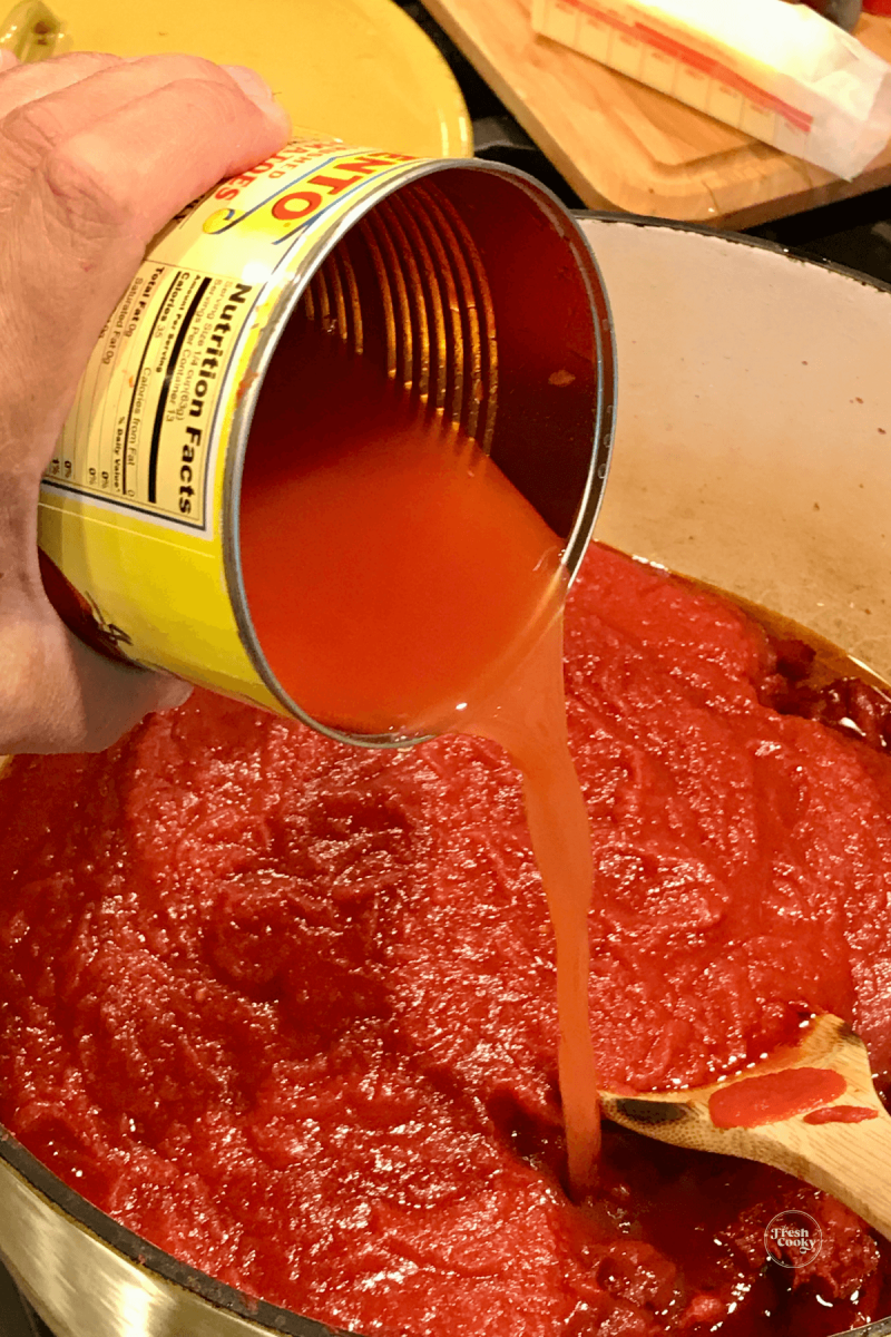 Water swished in can adding to tomato sauce. 