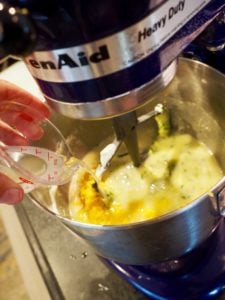 adding lemon juice to zucchini bread batter | www.thefreshcooky.com