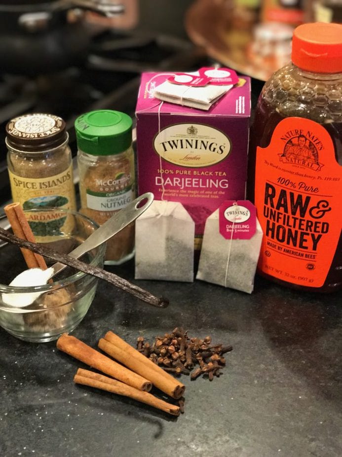 Ingredient image for Chai Tea Latte, L-R Cardamom, Nutmeg, Darjeeling Tea, Ra Honey, Vanilla Bean, Cinnamon Stick, Cloves, Ginger