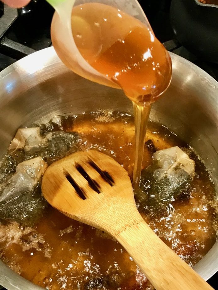 pouring in honey for chai latte | www.thefreshcooky.com