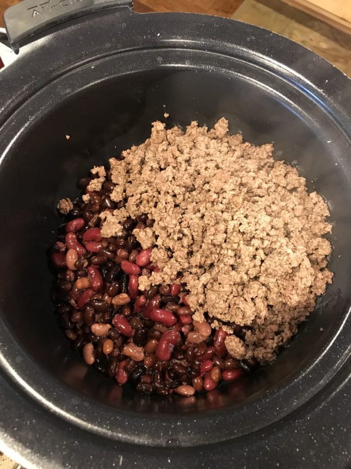 Tri-Color beans in crock pot with ground beef for firecracker chilli.