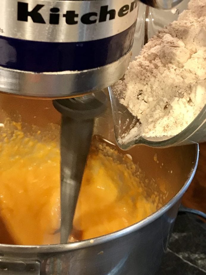 Pouring in flour for Carrot Cupcakes | www.thefreshcooky.com