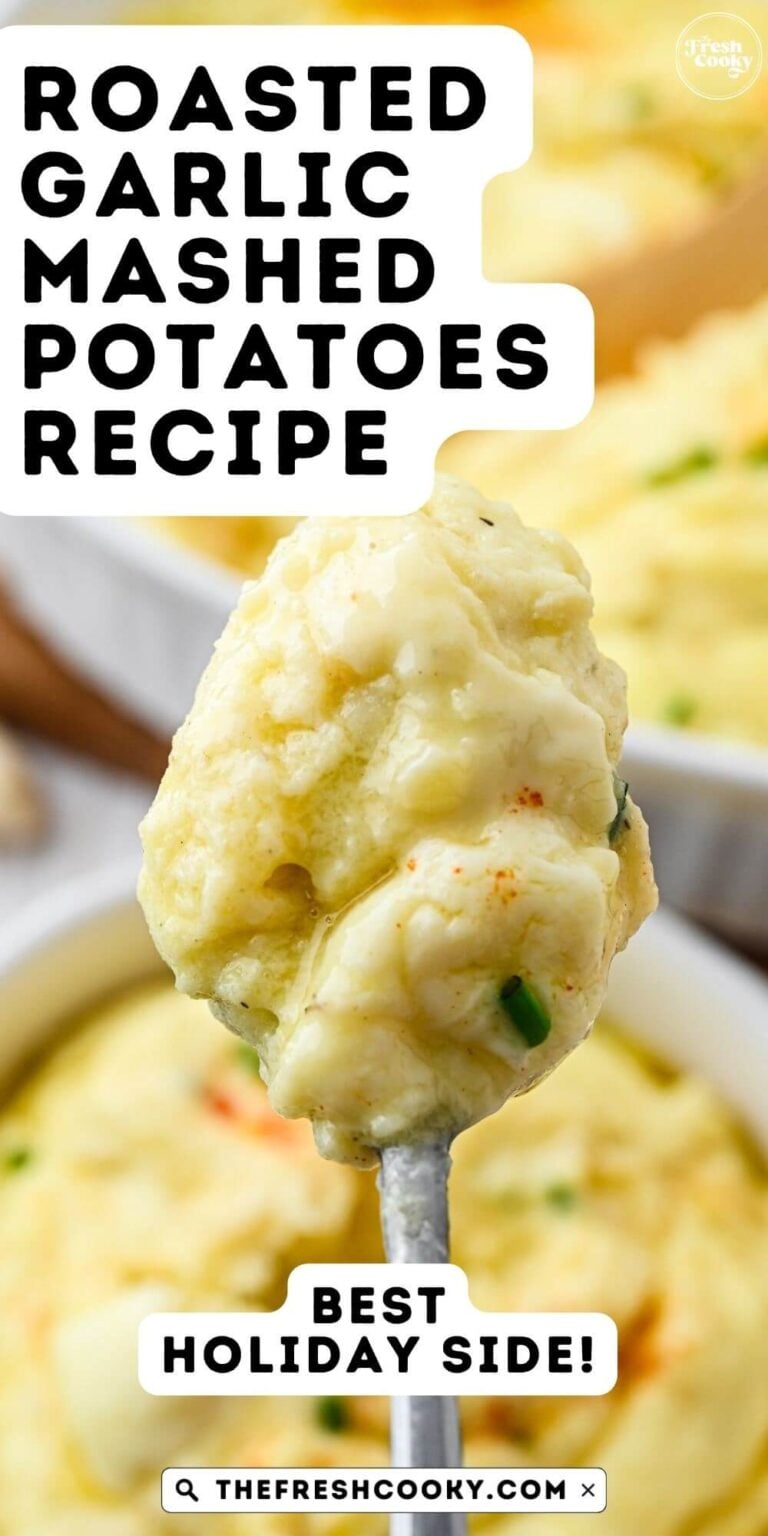 A spoonful of creamy mashed potatoes with a bowl and serving dish behind, to pin.