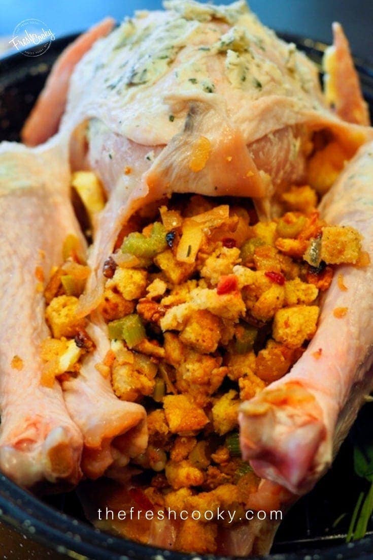 Butter herb slathered turkey stuffed with Apple Sausage Maple Stuffing 