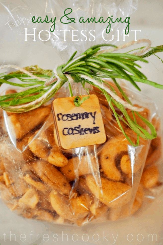 Pinterest Image for Rosemary Cashews with cello bag filled with cashews with raffia ribbon, fresh rosemary sprig and a wooden tag