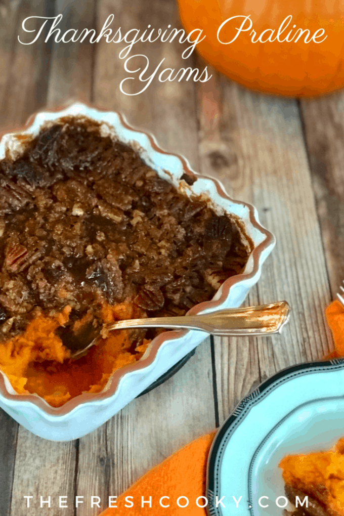 Delicious, simple and oh so yummy. This recipe for Thanksgiving Praline Yams has a crisp, buttery, pecan praline atop creamy, whipped yams (or sweet potatoes) with lively and bright flavors like orange juice and zest, ginger, and whiskey. A family favorite. #thefreshcooky #thanksgiving #yams #praline #sweetpotatoes #sides #holidaysides #mealplanning #makeahead