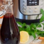 Homemade DIY Elderberry Syrup! Make on the stove top or Instant Pot! Great for preventing colds and flu. We take it at the first sign of flu season and continue to take it daily throughout the winter months. Easy to make, immune boosting syrup. #thefreshcooky #elderberrysryup #elderberries #diy #instantpot