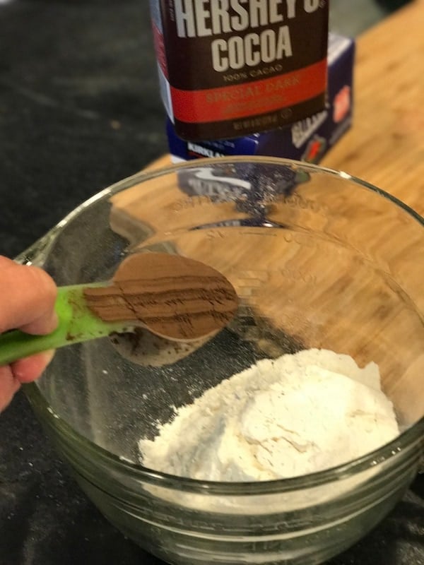 Tossing dark cocoa powder into flour | thefreshcooky