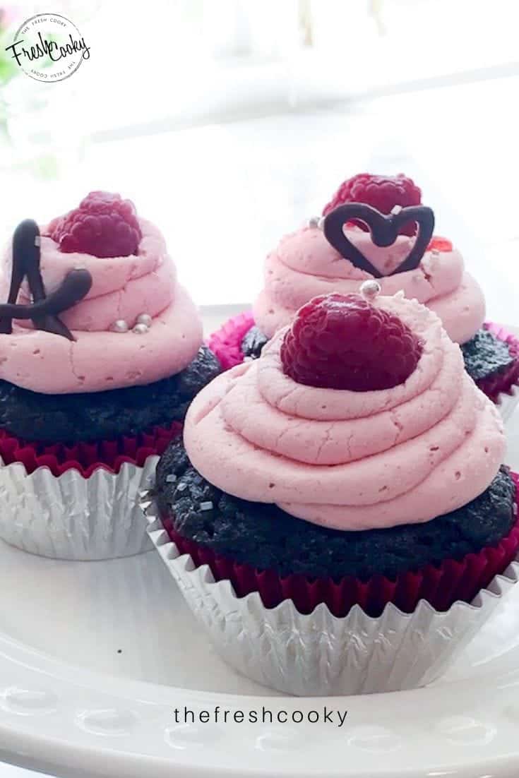 Rich Chocolate Cupcakes with Raspberry Buttercream and Ganache Filling