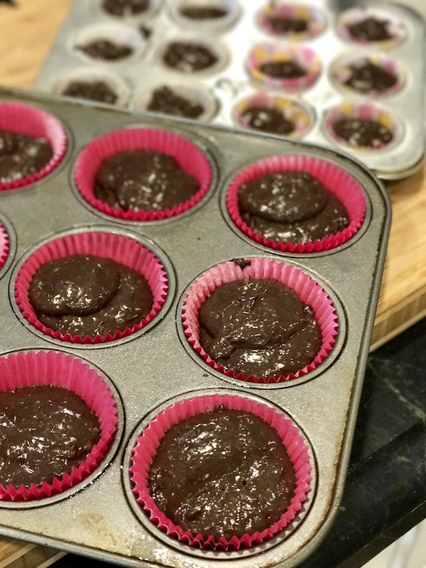 chocolate cupcake batter scooped into muffin tin | thefreshcooky