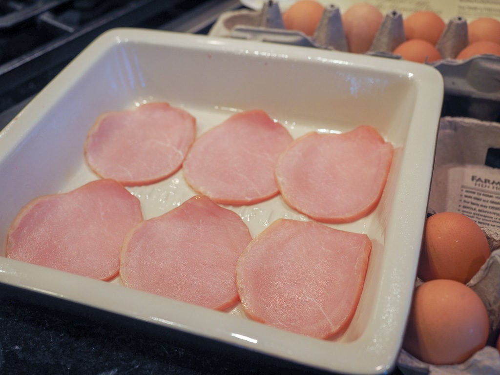 Canadian Bacon in pan for Mock Eggs Benedict | www.thefreshcooky.com #mockeggsbenedict #eggdish #eggsbenedict