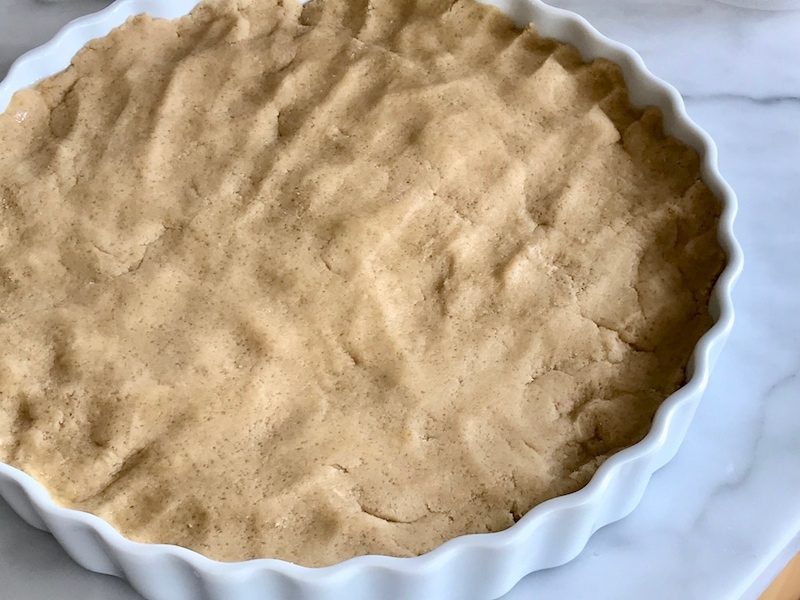Giant Sugar Cookie dough pressed into Tart Dish | www.thefreshcooky.com 