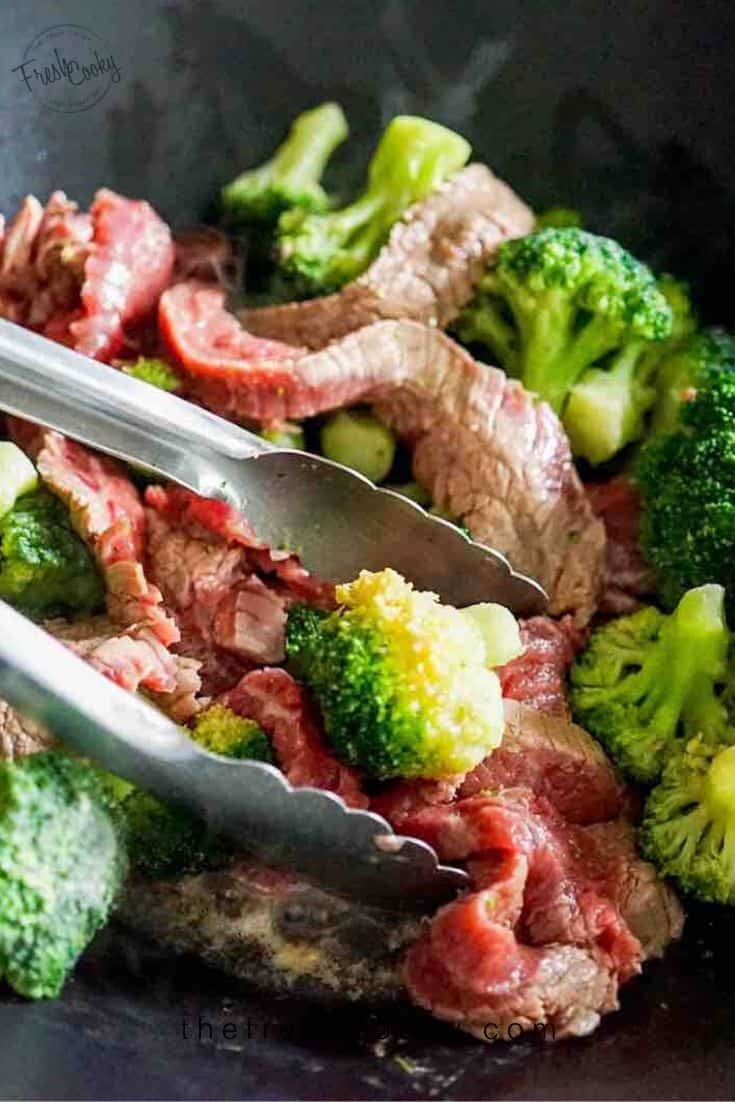 tons in pan with broccoli and beef sauteing for easy beef and broccoli.