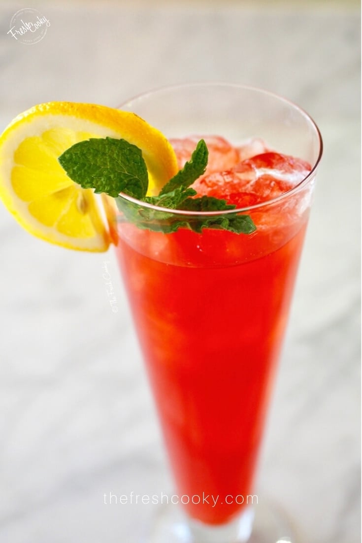 Glass filled with beautiful red, Texas Iced Tea. 