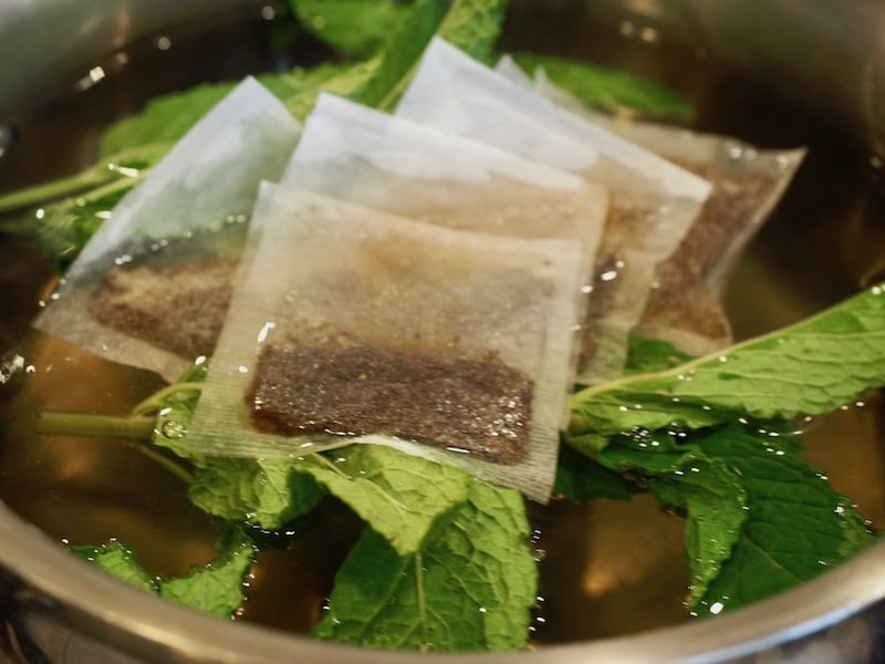 Tea bags in hot sugar water for Texas tea.