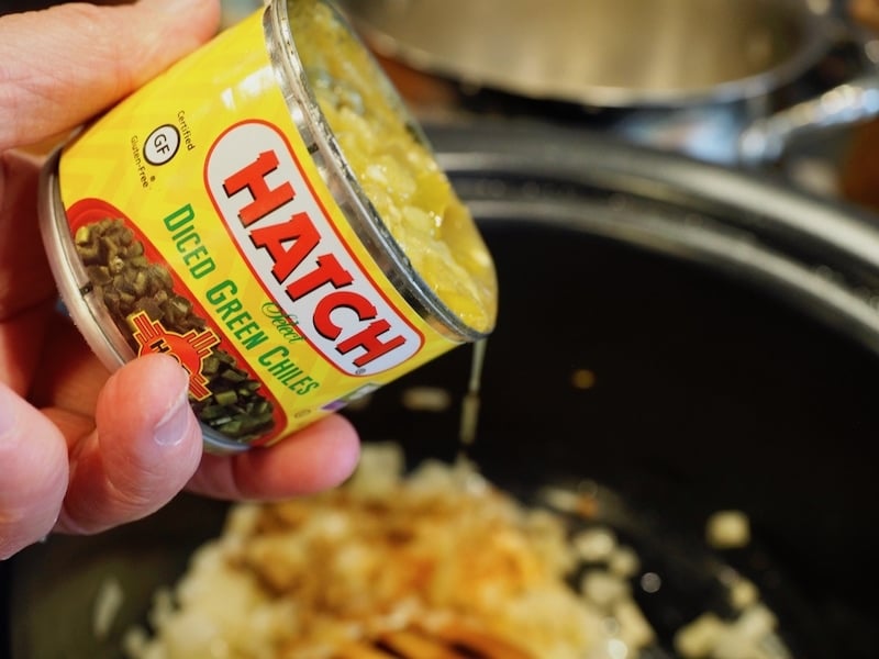 4 oz can of Hatch diced green chiles poured into onion mixture. thefreshcooky.com