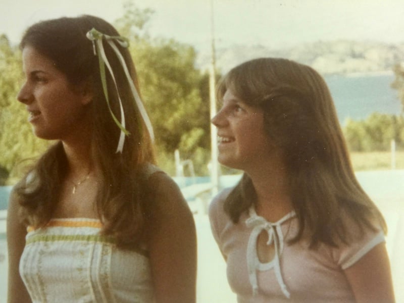 Kathleen and Julie, back in late 70's with lake in background. 