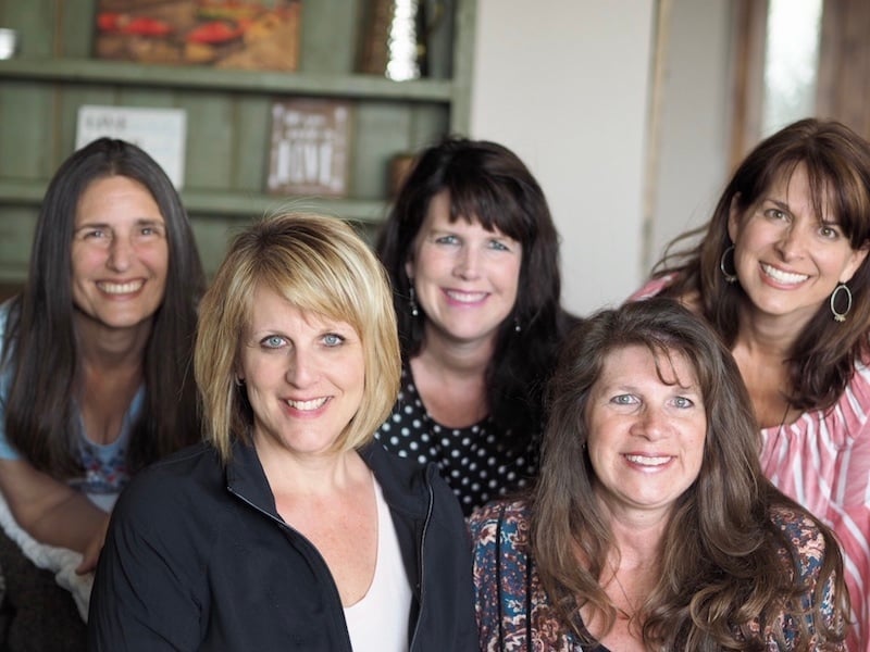 Five women in a photo, smiling, friend since teen years. Lis, Shawn, Kathleen, Dawn and Julie