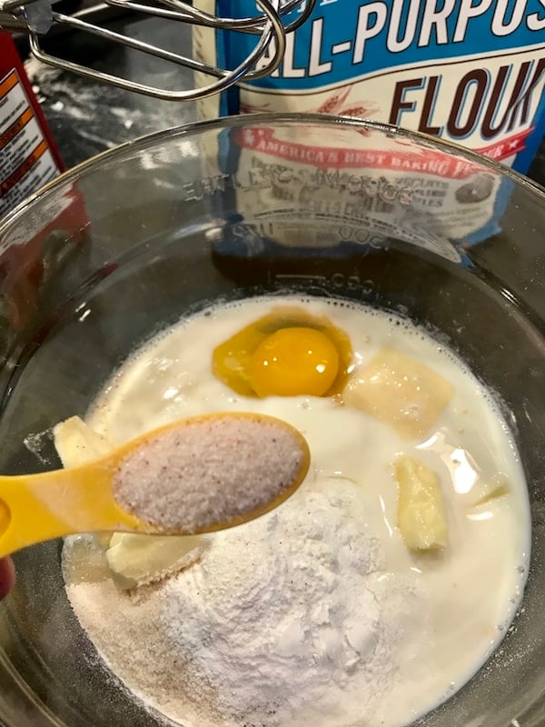 Process shot with butter, flour, egg, leavening and salt in mixing bowl for blueberry crumb cake.