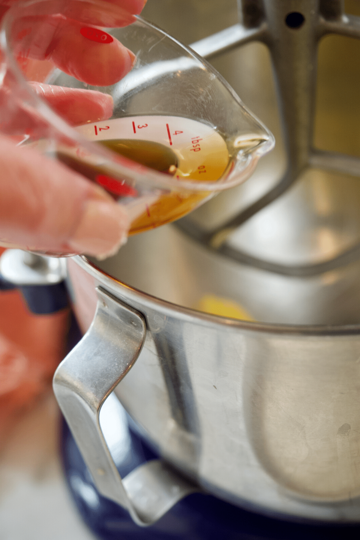 Adding vanilla to kentucky butter cake. 