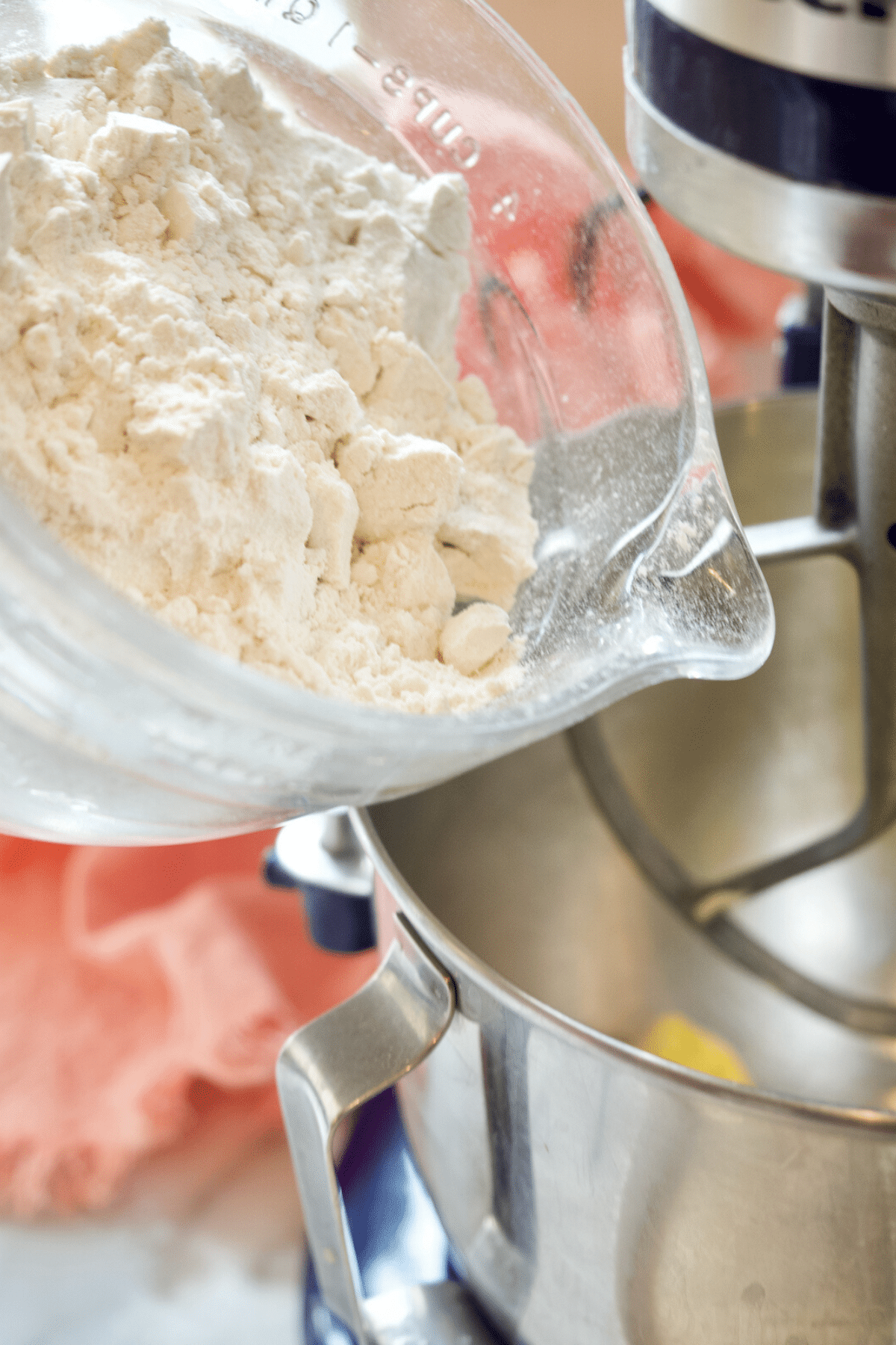 Adding flour to kentucky butter cake batter.