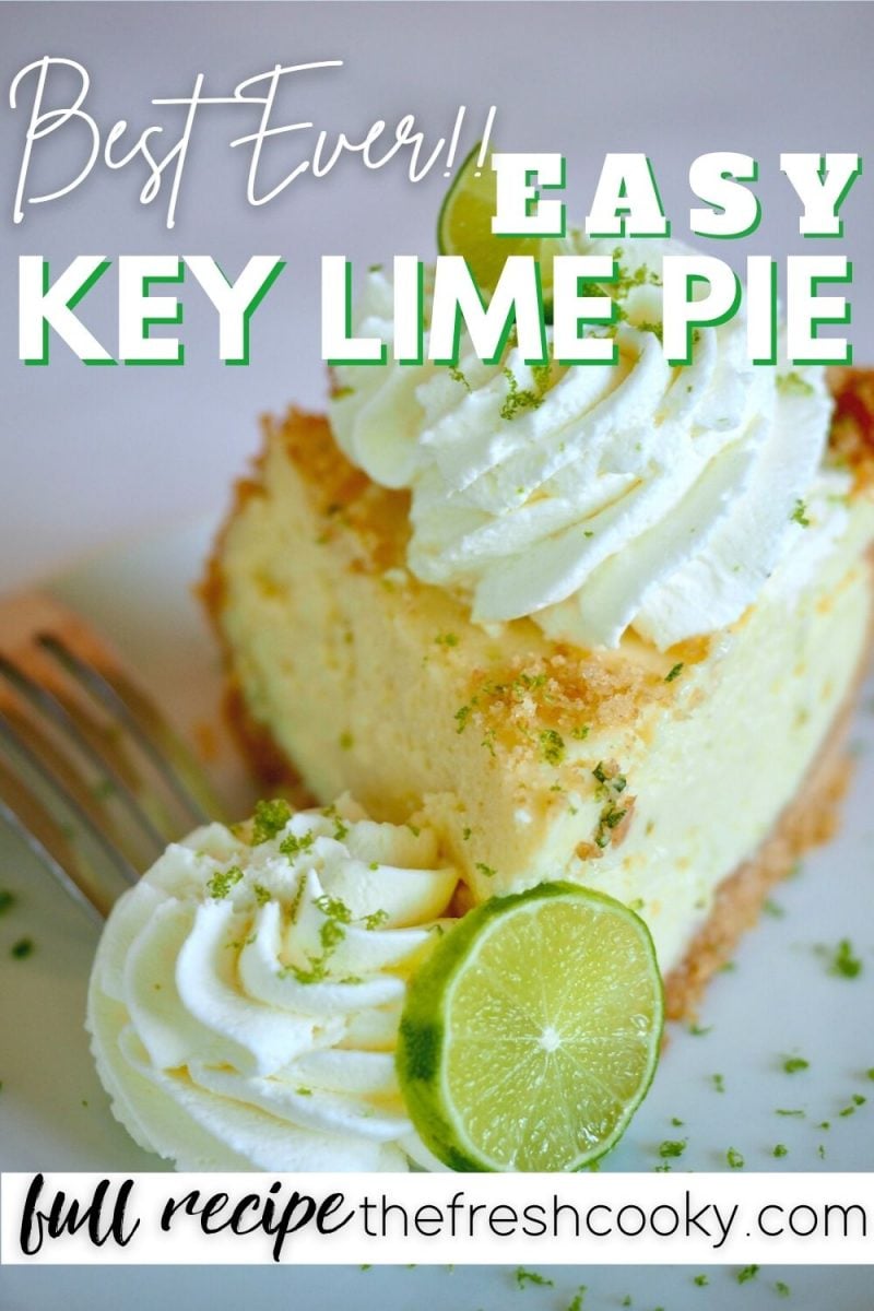 Best ever key lime pie with wedige of Key Lime Pie on white plate with fluffy dollops of whipped cream and slices of fresh lime.