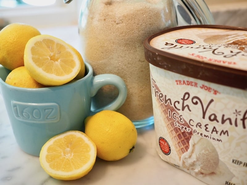 Ingredients for Frosted Lemonade, fresh lemons sliced, half gallon of vanilla ice cream, all natural cane sugar. | thefreshcooky.com