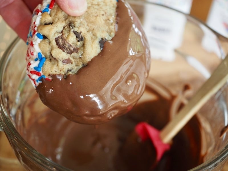 dipping ice cream sandwiches in melted chocolate for an extra decadent frozen treat. Recipe from thefreshcooky.com 