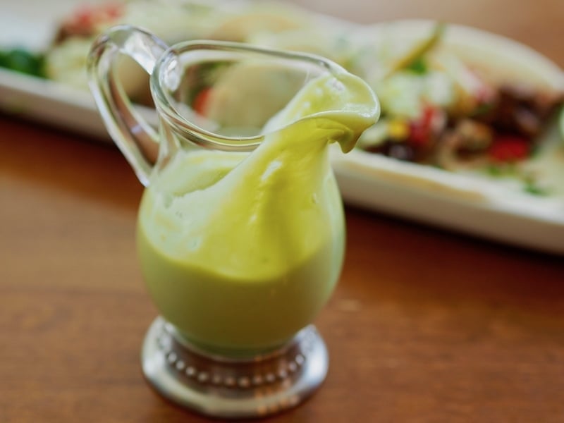 Avocado lime dressing for Mexican barbacoa beef street tacos.