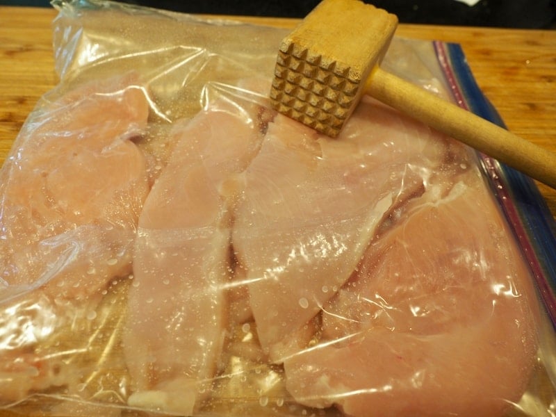 Pounding - Flattening Chicken Breasts.