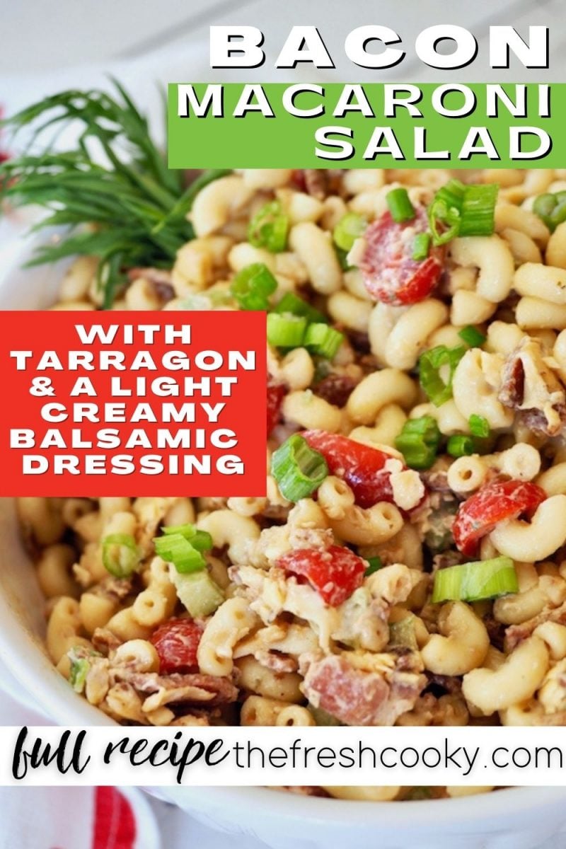 Close up of bacon macaroni salad with bacon and a bit of fresh tarragon on the side.