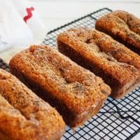 This is the moistest most flavorful banana bread recipe. With the addition of oat and graham flours, reduced sugar and a touch of honey, it makes for the perfect afterschool snack! #bananabread #oatflour #grahamflour #healthy #afterschoolsnack #simple #bananaoatbread #brunch #quickbread #thefreshcooky