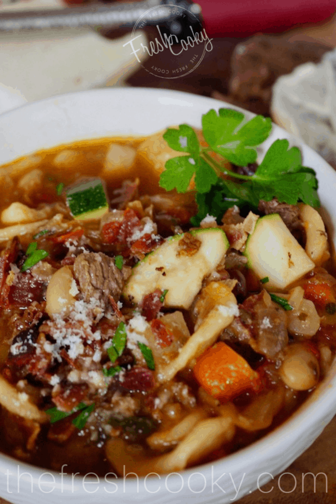 Bowl of bacon beef minestrone soup, closeup.