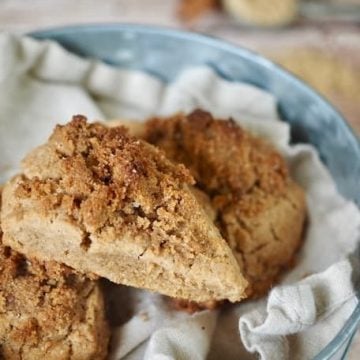 These Cinnamon Crunch Scones are a buttery, tender whole-grain, cream scones that are full of sweet cinnamon flavor and not the least bit dry. The Cinnamon Crumb Crunch topping is the best part! Perfect for a morning tea, breakfast or brunch or an afterschool snack! #thefreshcooky #scones #cinnamonscones #crumbtopping #brownsugar #fallbaking #recipe