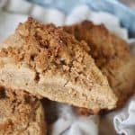 These Cinnamon Crunch Scones are a buttery, tender whole-grain, cream scones that are full of sweet cinnamon flavor and not the least bit dry. The Cinnamon Crumb Crunch topping is the best part! Perfect for a morning tea, breakfast or brunch or an afterschool snack! #thefreshcooky #scones #cinnamonscones #crumbtopping #brownsugar #fallbaking #recipe
