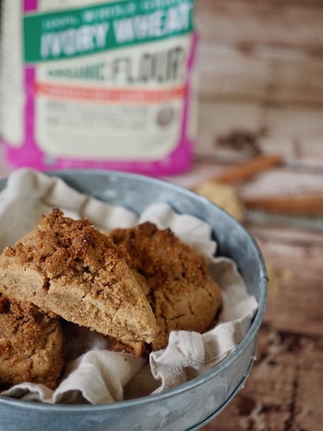 Whole grain Cinnamon Crunch Scones are buttery, tender with an amazing cinnamon sugar crumb topping. They are perfect, quick homemade treat for a chilly fall morning. #thefreshcooky #cinnamoncrunch #scones #brownsugar #wholegrain #fallrecipe #thanksgiving