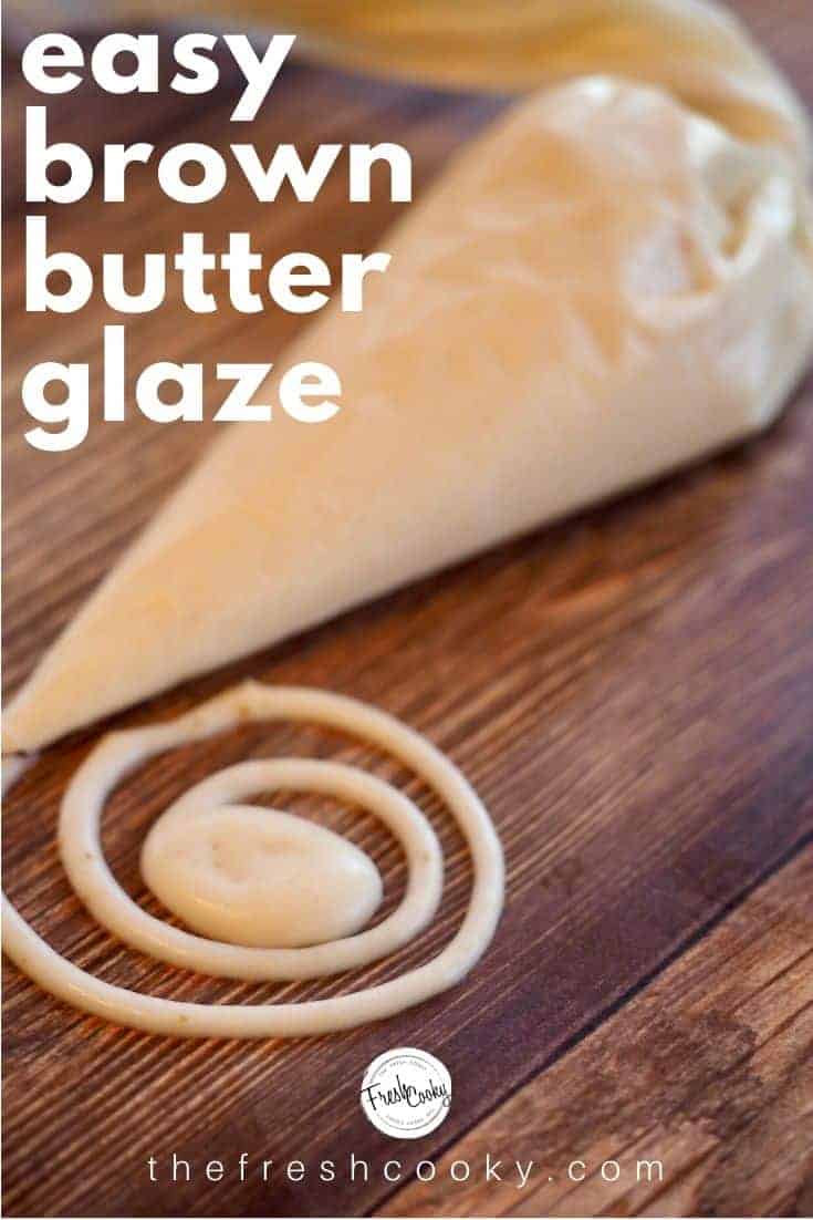 Pinterest Image with text overlay "Easy Brown Butter Glaze" with a photo of a piping bag of brown butter icing and a round swirl of glaze on a wooden table. 