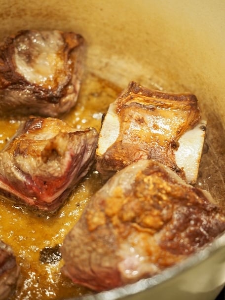 Browning short ribs in dutch oven for Italian Short Ribs.