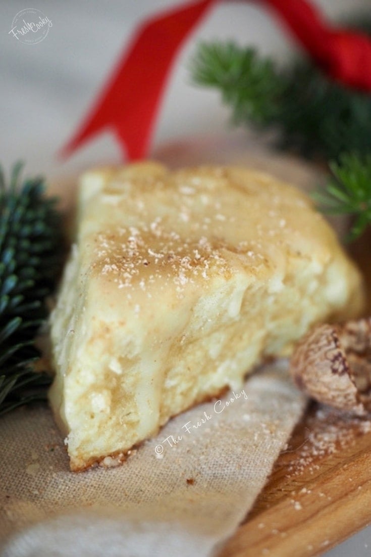 eggnog scone with greenery behind |thefreshcooky.com