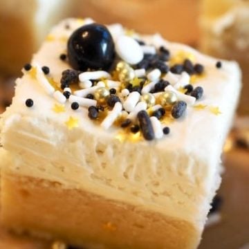 Black and Gold sprinkled thickly frosted sugar cookie bar
